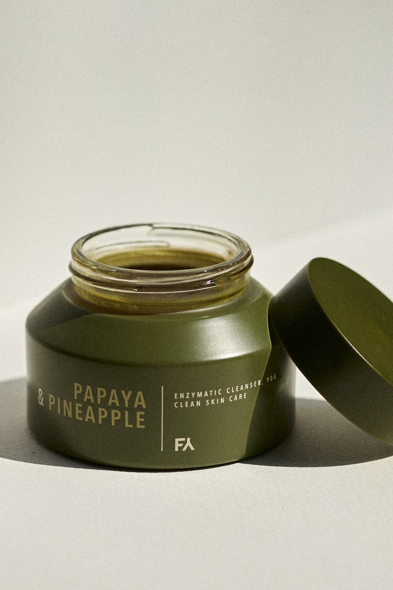 Picture of the Papaya & Pineapple Enzymatic Cleanser by Fields of Yarrow product jar with the lid opened